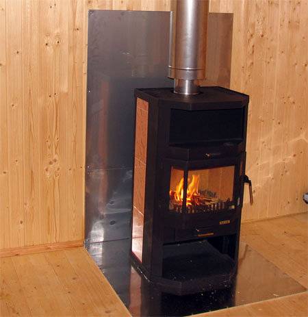 Чем изолировать печь в бане от деревянной стены: огнеупорный материал возле печки